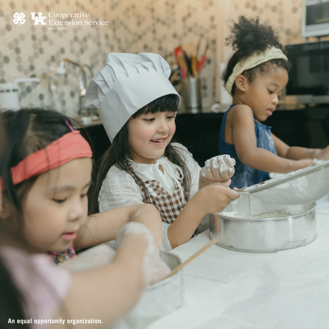4-H Cooking Club advertisement image. Shows three young girls in the kitchen mixing ingredients. 